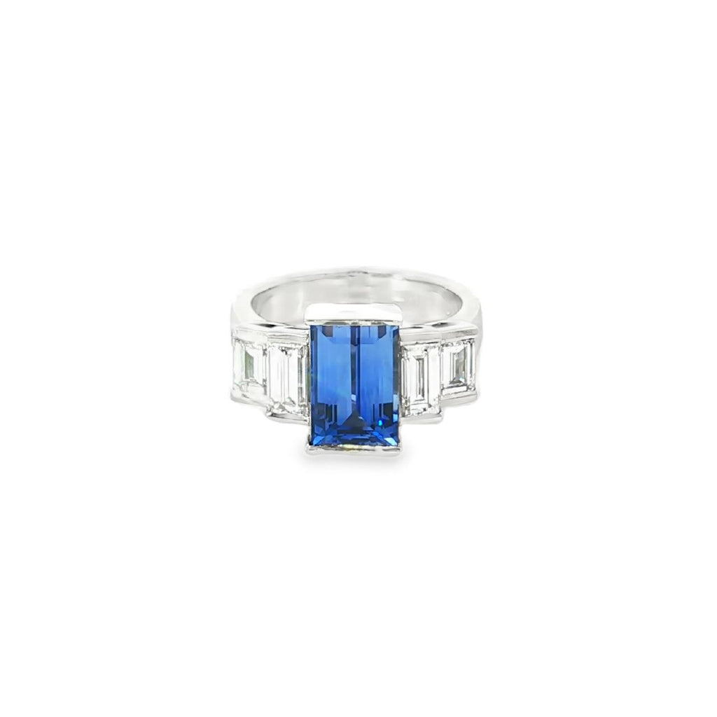 Platinum five-stone baguette sapphire and diamond ring with a 3.66ct centre sapphire and baguette diamond shoulders.