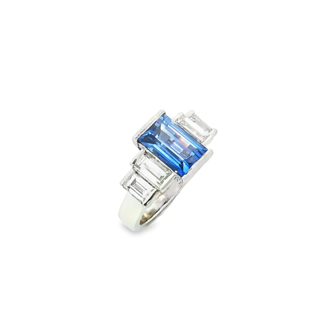 Platinum five-stone baguette sapphire and diamond ring with a 3.66ct centre sapphire and baguette diamond shoulders.