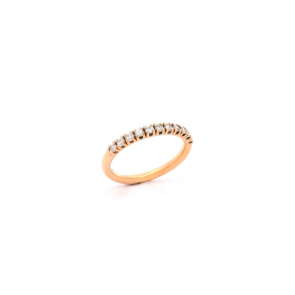 18ct rose gold diamond ring featuring a straight row of claw-set round brilliant cut diamonds across the top.
