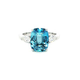 18ct white gold aquamarine ring with pear cut diamond side stones