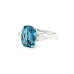 18ct white gold aquamarine ring with pear cut diamond side stones