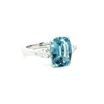 18ct white gold aquamarine ring with pear cut diamond side stones