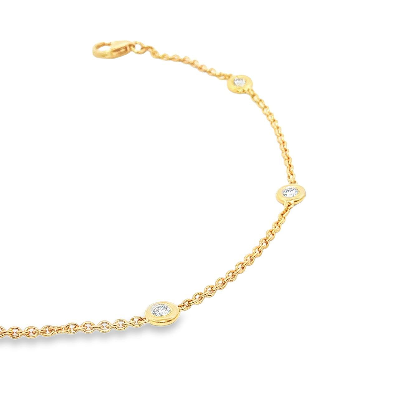 18ct yellow gold trace link bracelet with five bezel-set natural round brilliant cut diamonds