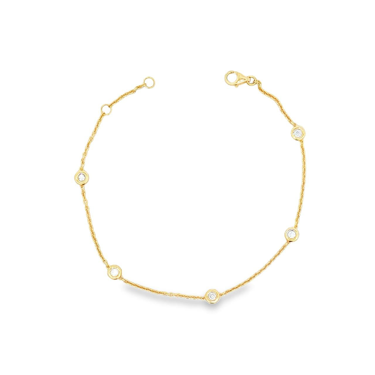 18ct yellow gold trace link bracelet with five bezel-set natural round brilliant cut diamonds