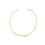 18ct yellow gold trace link bracelet with five bezel-set natural round brilliant cut diamonds