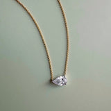 18ct yellow and white gold east-west necklet with GIA certified 1.01ct natural pear brilliant cut diamond