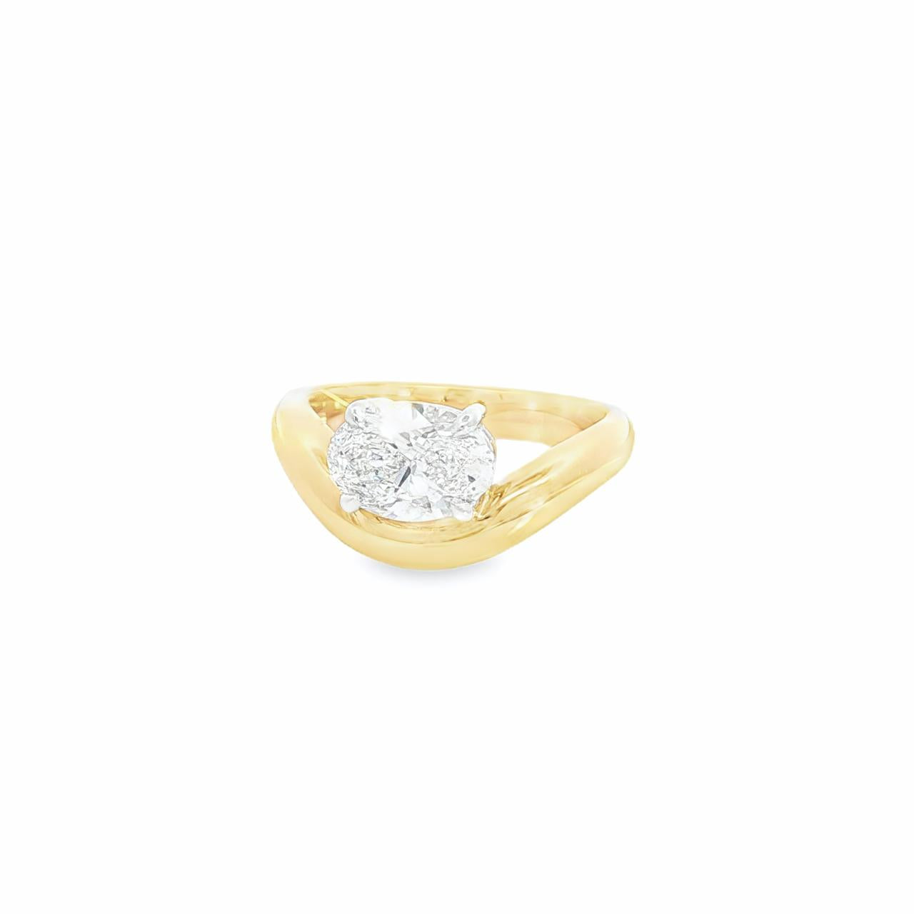 18ct yellow and white gold oval diamond bombe ring with 1.50ct East–West set oval diamond