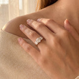 18ct yellow and white gold three stone diamond ring with 1.37ct centre diamond and two round brilliant side diamonds.