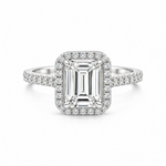 An emerald-cut halo ring featuring a large rectangular center stone surrounded by a halo of small round diamonds, set on a slim pavé band, shown against a plain white background.