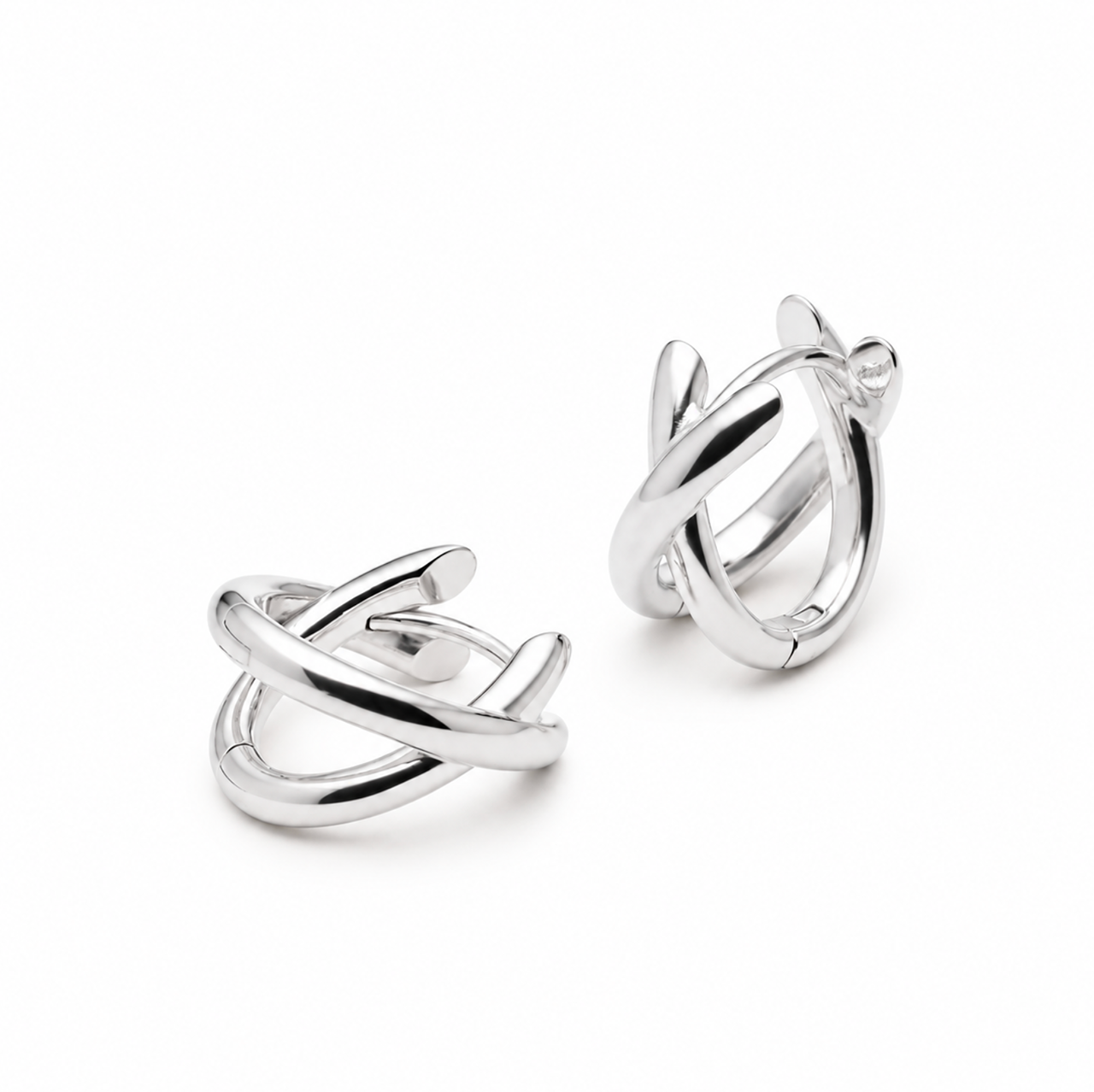 Sterling silver double-strand huggie earrings with polished crossover X design.