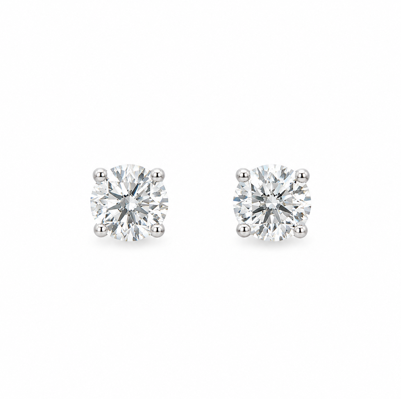 1.00ct natural diamond stud earrings in 18ct white gold with four-claw settings.