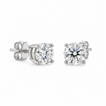 18ct white gold diamond stud earrings featuring two round brilliant cut diamonds totalling 2.48ct, with four-claw settings and butterfly fittings.