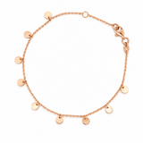 9ct rose gold trace link bracelet with polished disc drops.