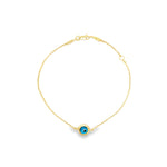9ct yellow gold fine trace link bracelet with a blue Evil Eye centre charm and bolt ring clasp.
