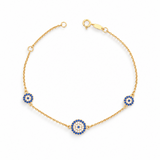 9ct yellow gold station bracelet with three round Evil Eye charms set with blue and colourless cubic zirconias.