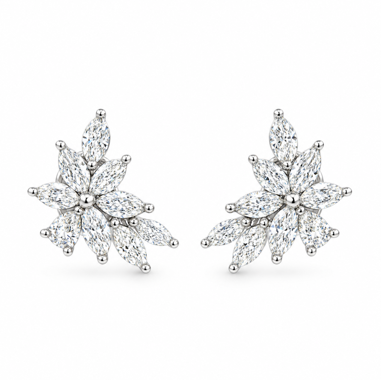 18ct white gold diamond cluster earrings featuring marquise and pear cut diamonds in a tiered multi-claw spray design with post and butterfly fittings.