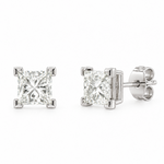 A pair of princess-cut diamond stud earrings in a white gold four-prong setting, shown from both front and side angles on a white background.