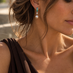 18ct white gold drop earrings featuring oval South Sea pearls, emerald cut ombré bi-colour tourmalines and bezel set natural round brilliant cut diamonds.