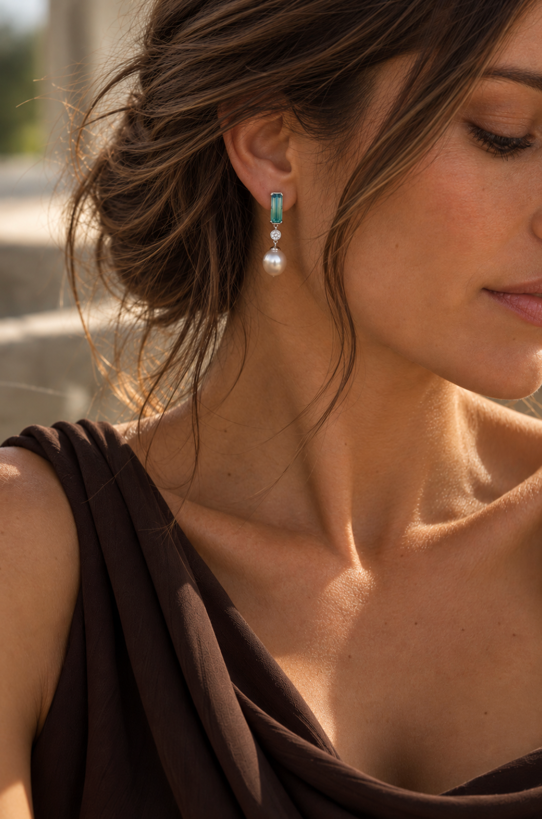 18ct white gold drop earrings featuring oval South Sea pearls, emerald cut ombré bi-colour tourmalines and bezel set natural round brilliant cut diamonds.