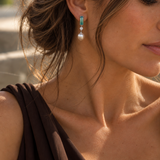 18ct white gold drop earrings featuring oval South Sea pearls, emerald cut ombré bi-colour tourmalines and bezel set natural round brilliant cut diamonds.