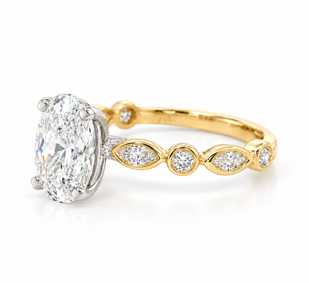 Side view of 2.50ct oval diamond engagement ring showing the white gold centre setting and yellow gold diamond-set shoulders.