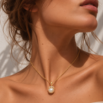 18ct yellow gold South Sea pearl and diamond pendant featuring a 14mm light golden pearl with a sculptural pavé diamond-set cap.