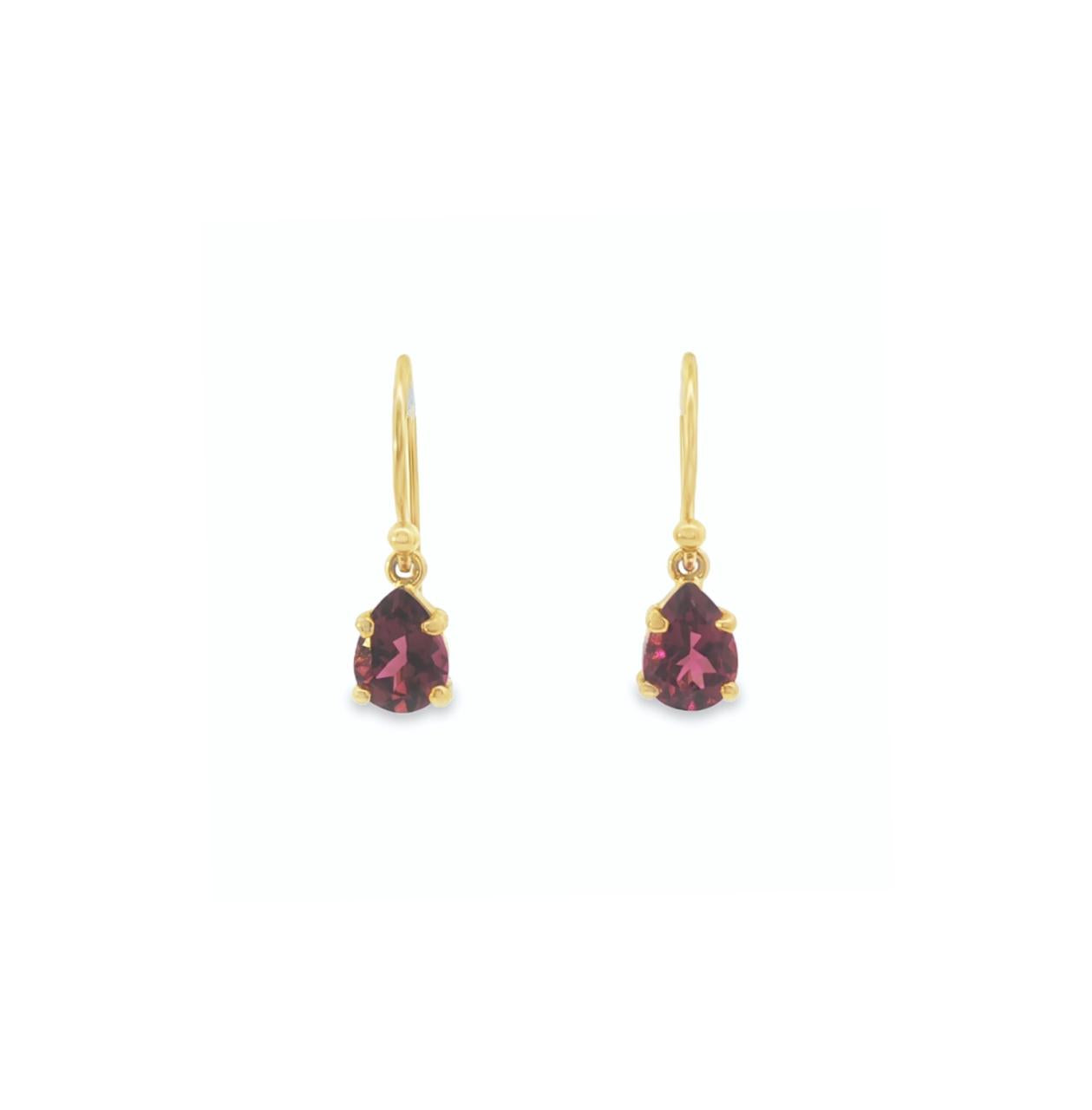 18ct yellow gold drop earrings featuring 8x6mm pear-cut pink tourmalines in claw and cap settings with elegant hook fittings. Romantic and timeless design.