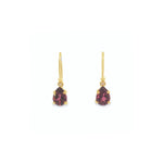 18ct yellow gold drop earrings featuring 8x6mm pear-cut pink tourmalines in claw and cap settings with elegant hook fittings. Romantic and timeless design.