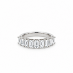 18ct white gold ring featuring nine emerald cut diamonds totalling 2.15ct in a straight row claw setting with a scalloped undercarriage.