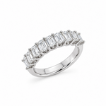 18ct white gold ring featuring nine emerald cut diamonds totalling 2.15ct in a straight row claw setting with a scalloped undercarriage.