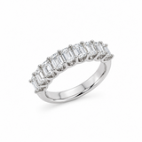 18ct white gold ring featuring nine emerald cut diamonds totalling 2.15ct in a straight row claw setting with a scalloped undercarriage.