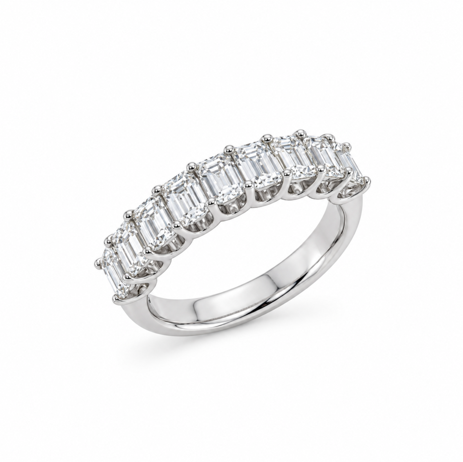 18ct white gold ring featuring nine emerald cut diamonds totalling 2.15ct in a straight row claw setting with a scalloped undercarriage.