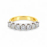 Seven-stone diamond ring in 18ct yellow and white gold featuring 1.38ct of round brilliant cut diamonds in shared-claw settings.