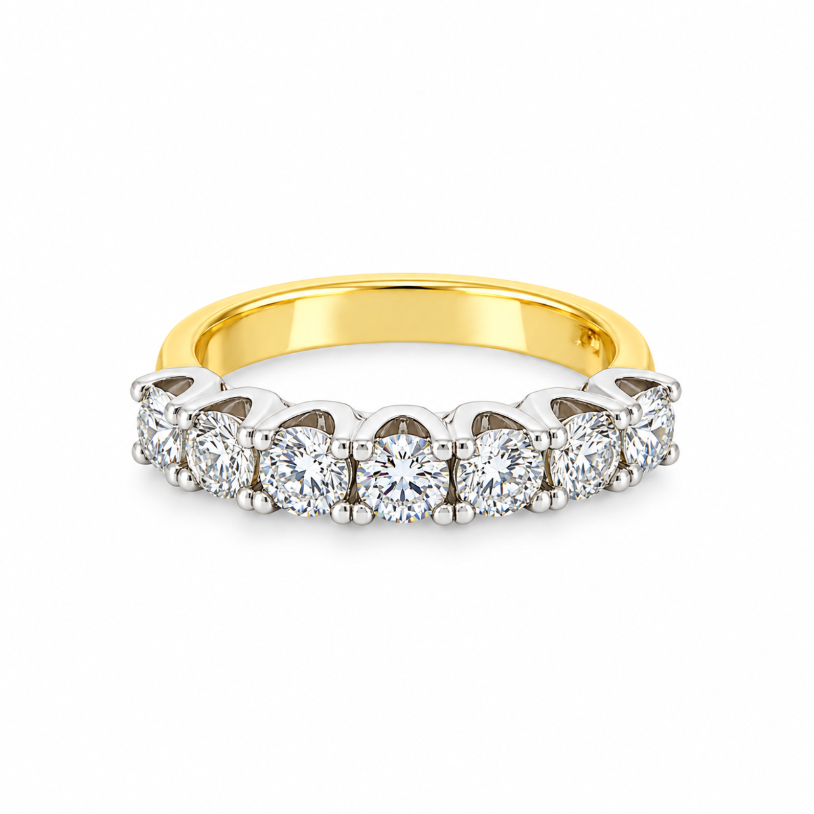 Seven-stone diamond ring in 18ct yellow and white gold featuring 1.38ct of round brilliant cut diamonds in shared-claw settings.