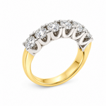 Side view of seven-stone diamond ring showing the distinctive V-shaped undercarriage beneath the shared-claw diamond settings.