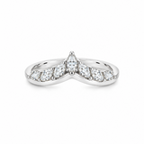 18ct white gold tiara-style ring featuring seven marquise cut diamonds totalling 0.33ct, claw set to form a delicate pointed crown shape.