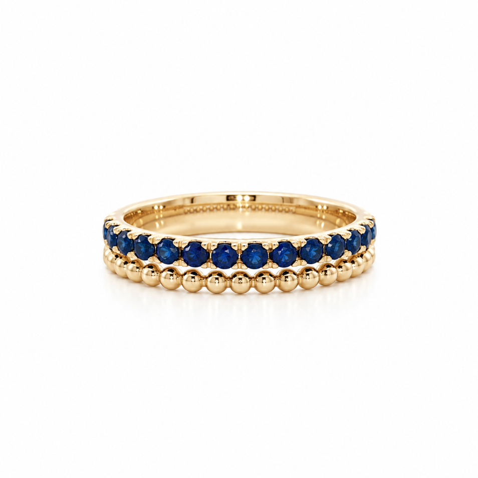 18ct yellow gold band ring with 14 round cut natural sapphires and beaded detailing
