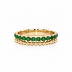 18ct yellow gold band ring with 14 round cut natural emeralds and beaded detailing