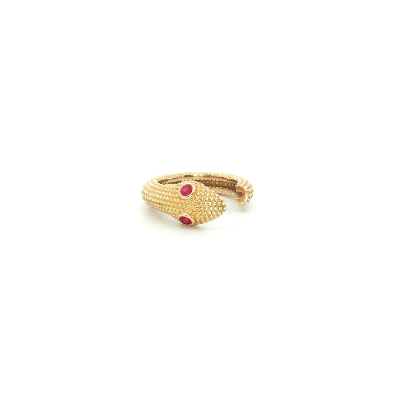 9ct yellow gold snake ear cuff with a beaded textured finish and red cubic zirconia eyes, designed for non-pierced ears.