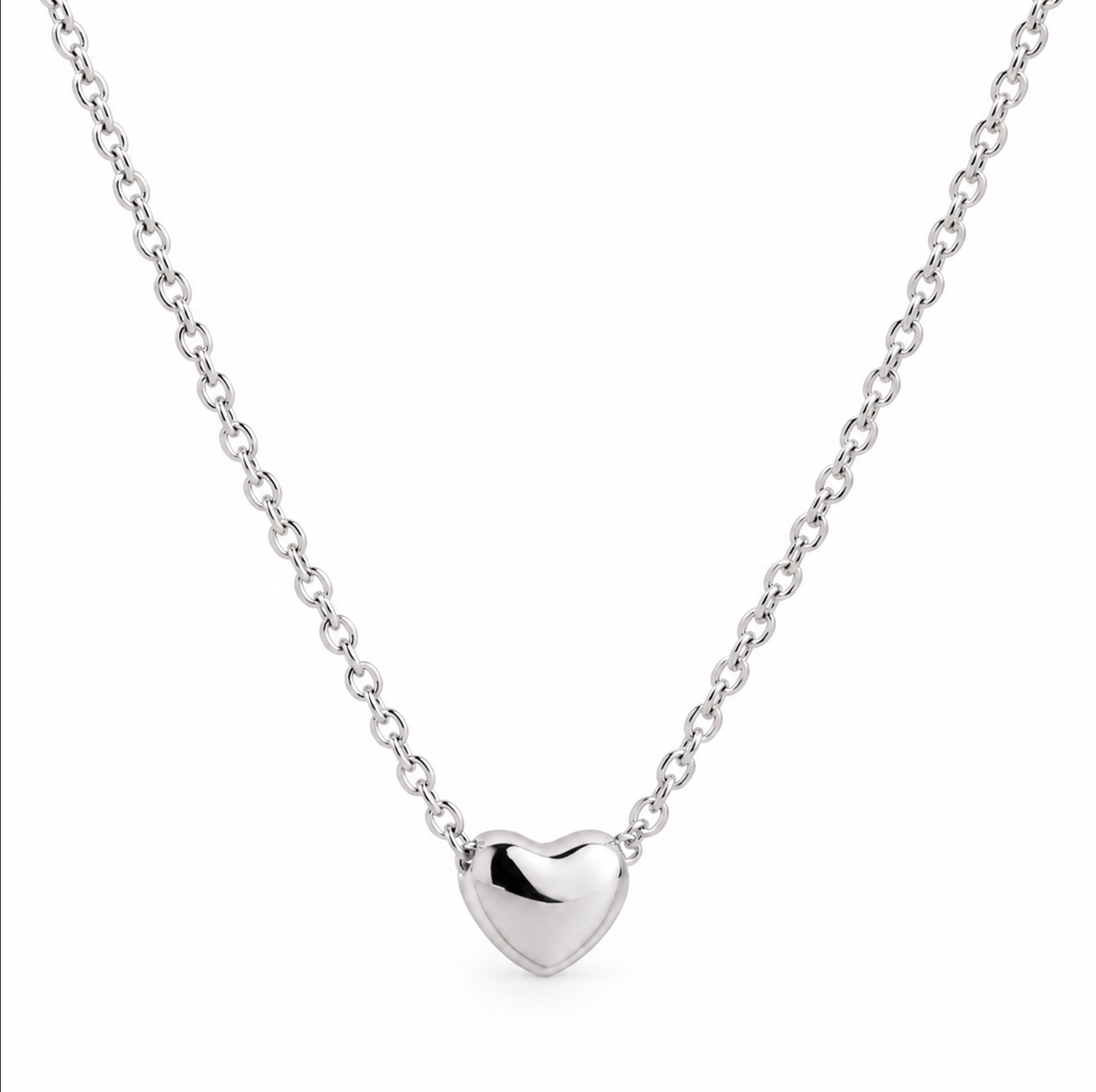 Sterling silver puff heart necklet with 5mm heart slider and fine trace link chain.