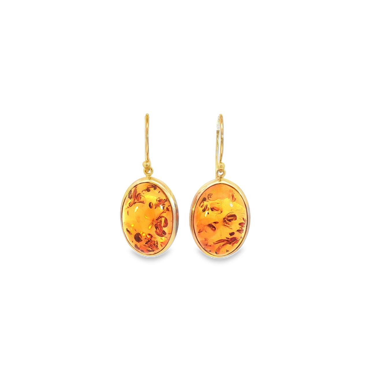 9ct yellow gold amber oval cabochon drop earrings with bezel settings.