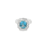 18ct white gold aquamarine and diamond ring featuring a 2.56ct cushion cut aquamarine surrounded by twelve round brilliant cut diamonds.