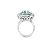 18ct white gold aquamarine and diamond ring featuring a 15.77ct cushion cut aquamarine surrounded by a cushion-shaped diamond halo.