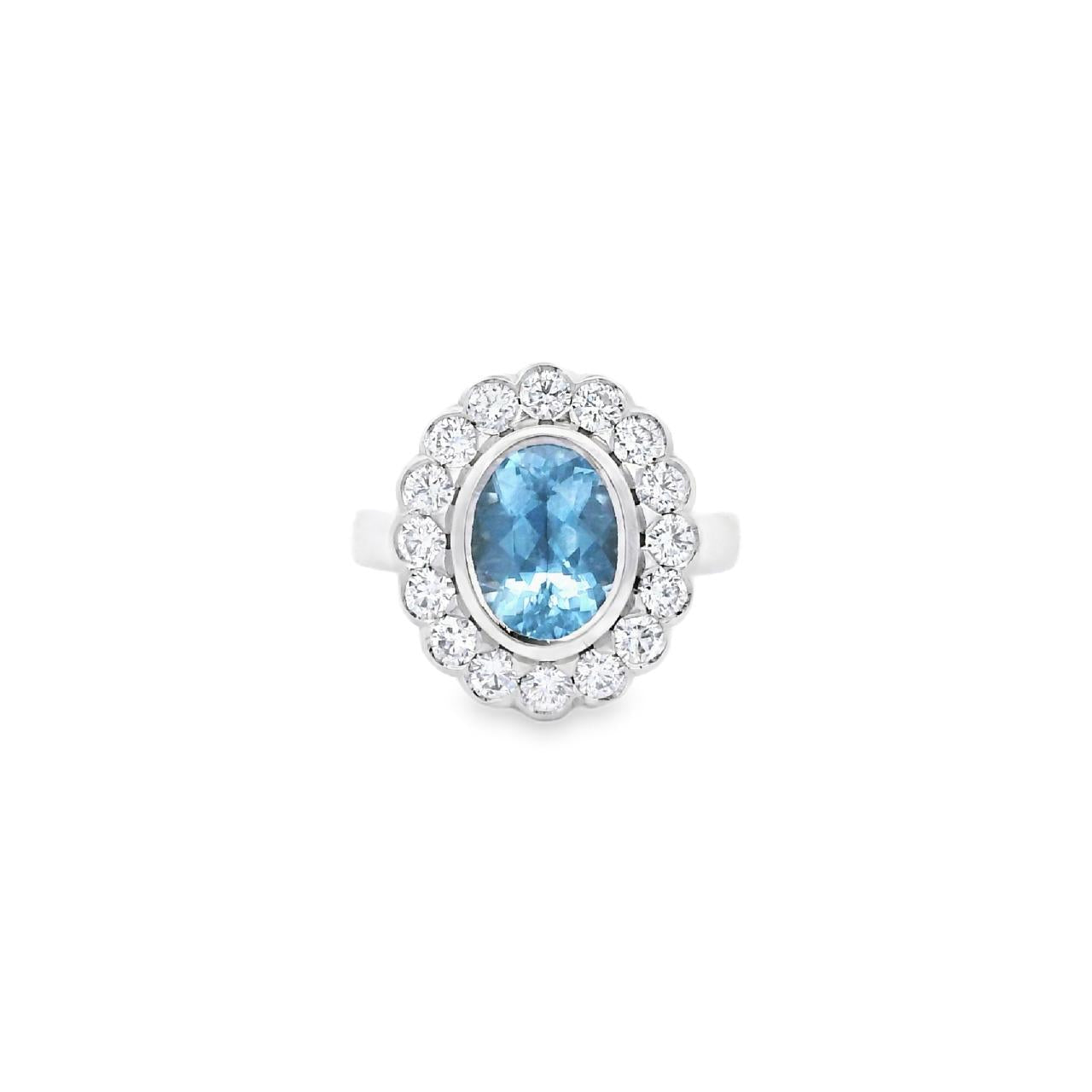 Platinum aquamarine and diamond halo ring featuring a 1.67ct oval aquamarine in a bezel setting with scalloped diamond surround and upswept shoulders, size N (resizeable).