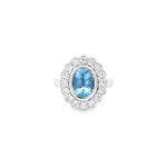 Platinum aquamarine and diamond halo ring featuring a 1.67ct oval aquamarine in a bezel setting with scalloped diamond surround and upswept shoulders, size N (resizeable).