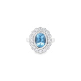Platinum aquamarine and diamond halo ring featuring a 1.67ct oval aquamarine in a bezel setting with scalloped diamond surround and upswept shoulders, size N (resizeable).