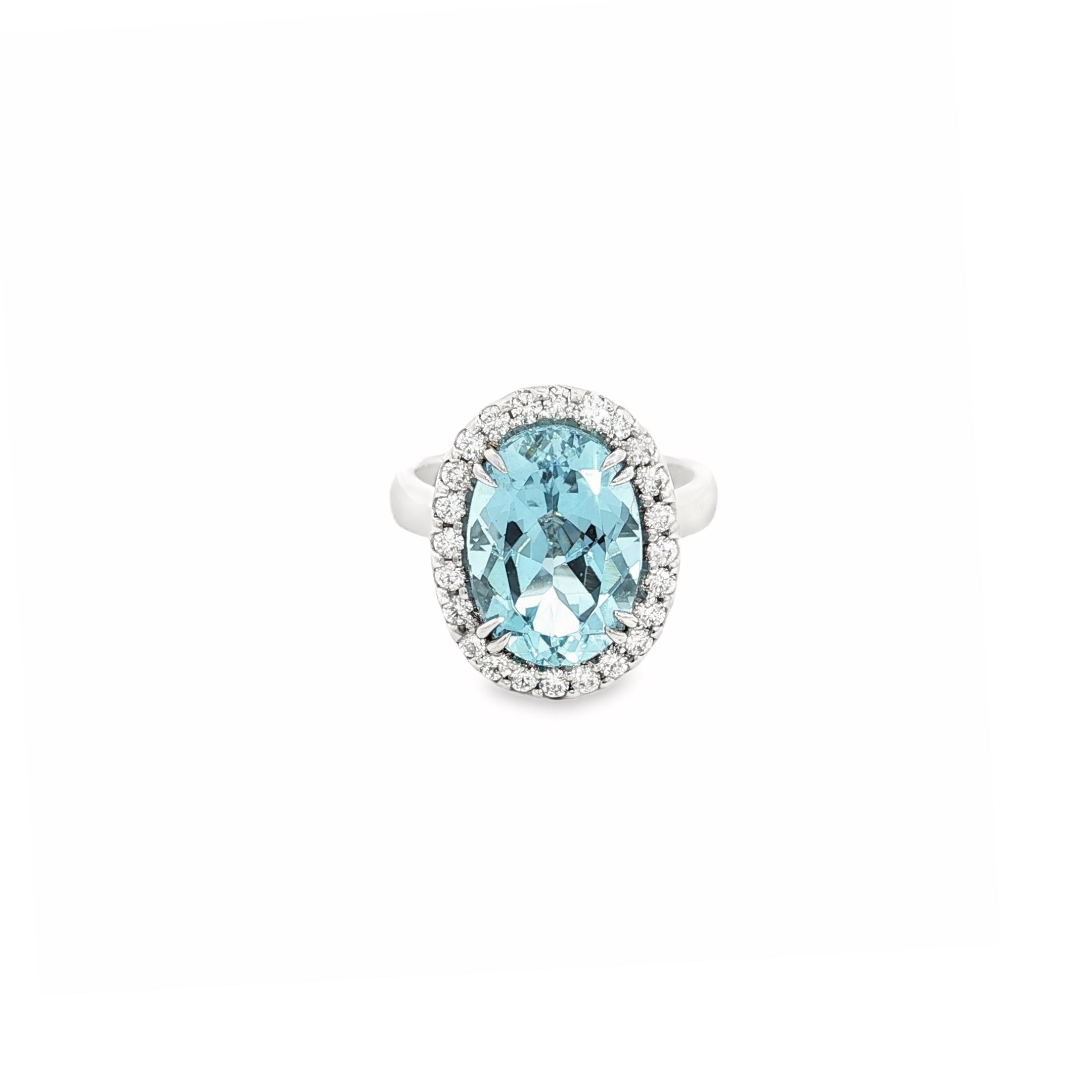18ct white gold aquamarine and diamond halo ring featuring a 5.38ct oval aquamarine with 24 round brilliant cut diamonds, size N (resizeable).
