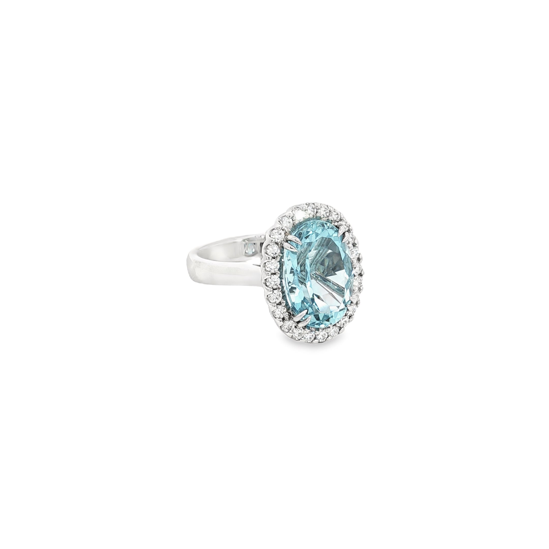 18ct white gold aquamarine and diamond halo ring featuring a 5.38ct oval aquamarine with 24 round brilliant cut diamonds, size N (resizeable).