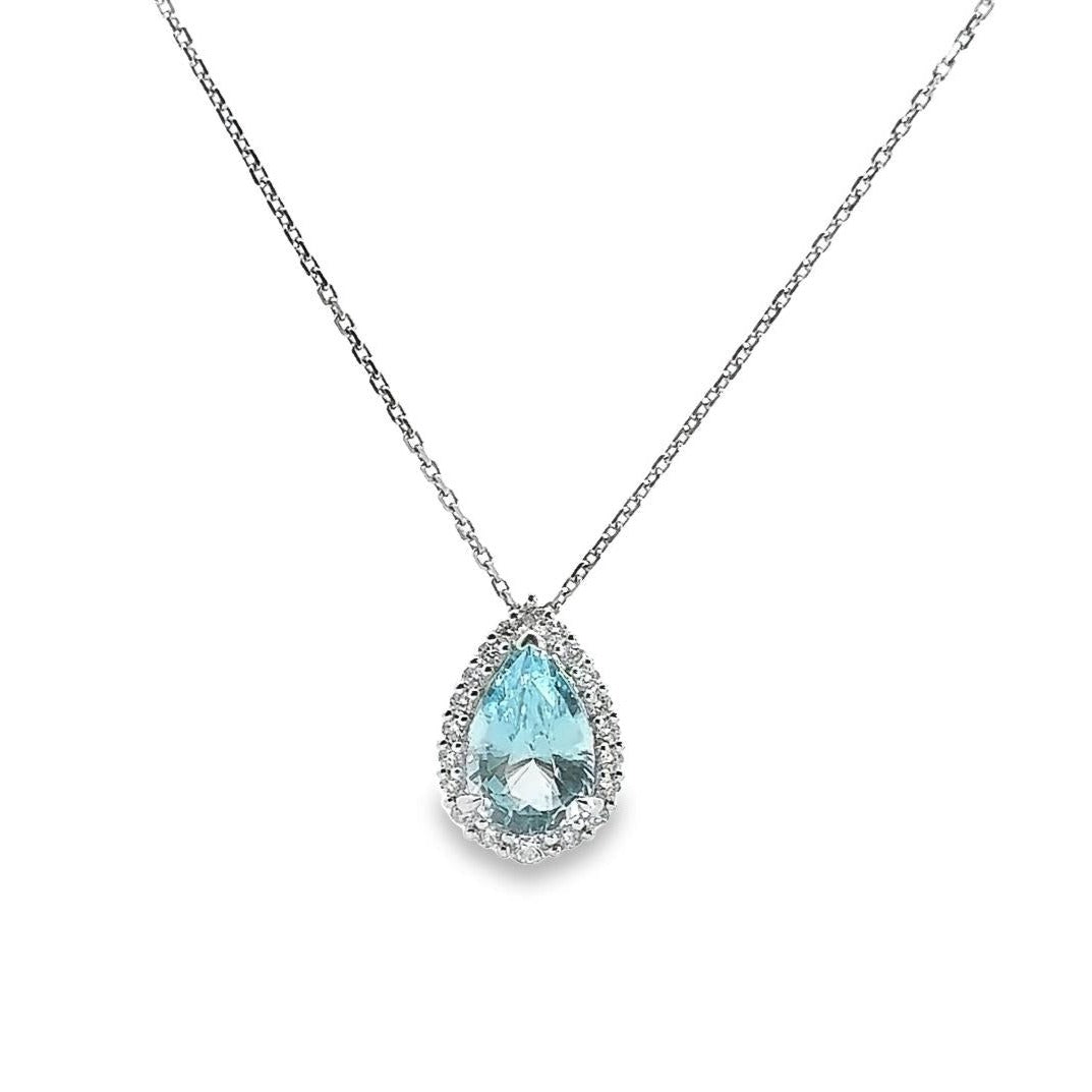 18ct white gold pendant featuring a 3.14ct pear-cut aquamarine in a three-claw setting with a graduated diamond halo surround and concealed pendant runner.