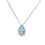 18ct white gold pendant featuring a 3.14ct pear-cut aquamarine in a three-claw setting with a graduated diamond halo surround and concealed pendant runner.